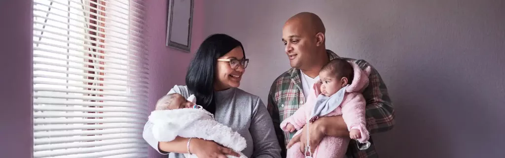 Young family with two newborns